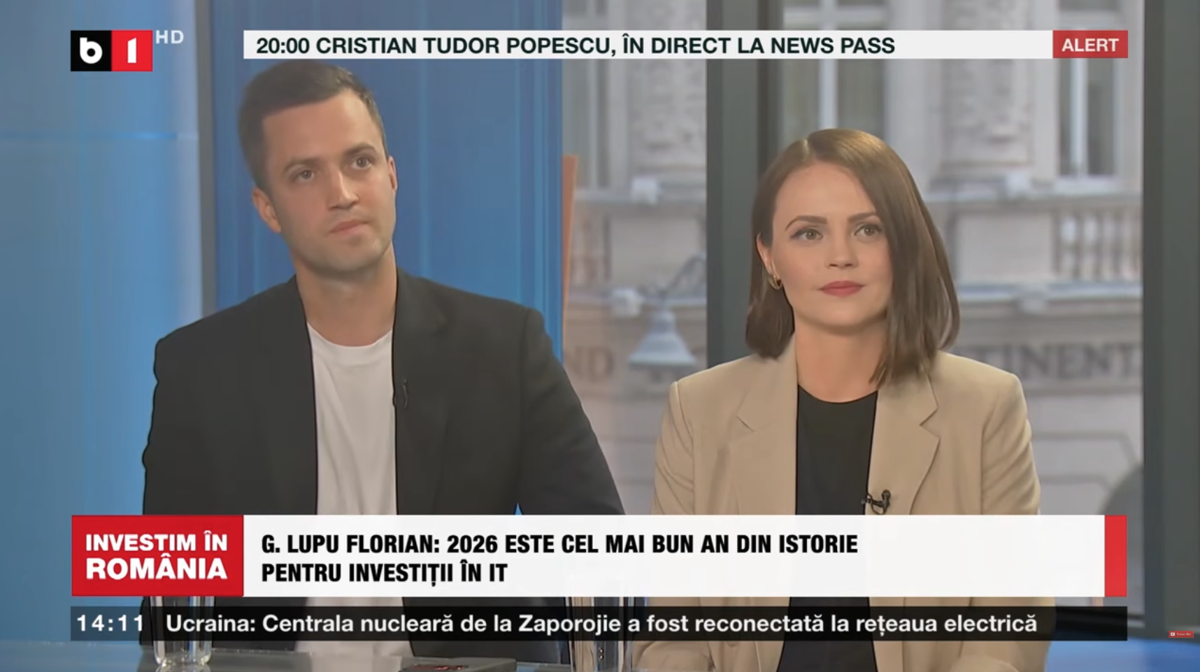 Adrian Florian and Georgina Lupu Florian on B1 TV's "Investim în România", with the caption "G. Lupu Florian: 2026 este cel mai bun an din istorie pentru investiții în IT" (2026 is the best year in history for IT investment)
