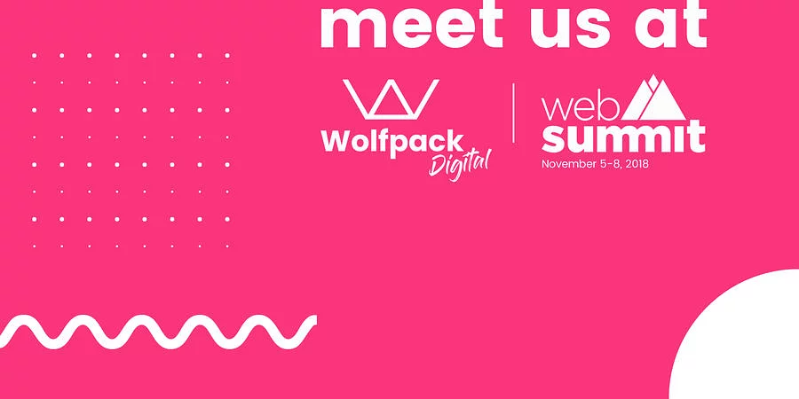 Pink promotional banner reading 'Meet us at Web Summit' with the Wolfpack Digital and Web Summit logos, dated November 5–8, 2018.