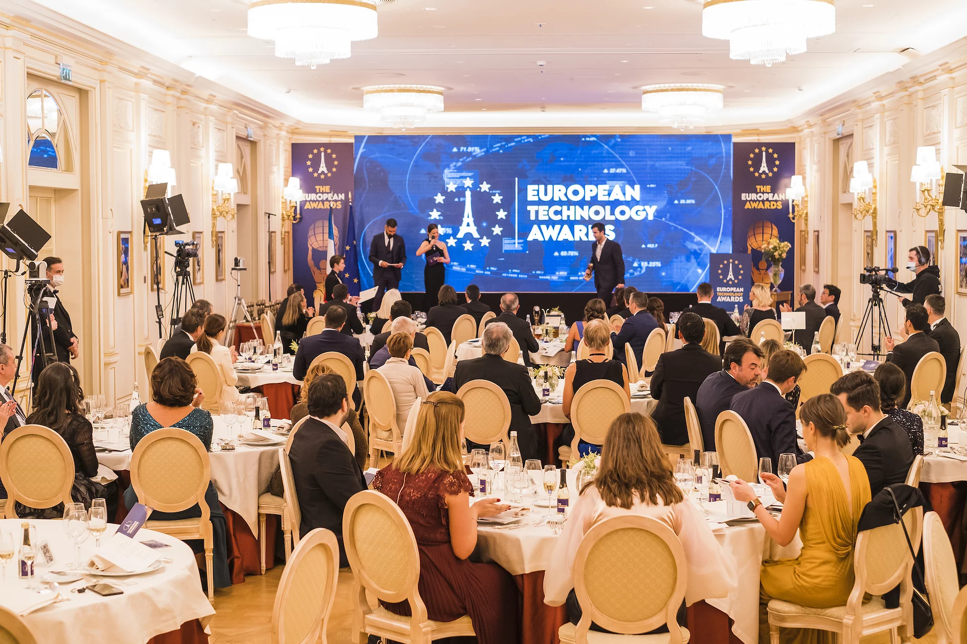 European Technology Awards gala at the Ritz in Paris, a ballroom of attendees at dinner tables facing the awards stage