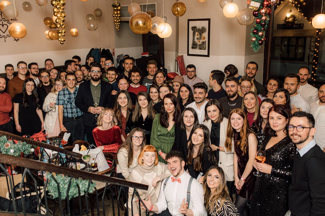 The full Wolfpack Digital team dressed up together at their festive Christmas dinner celebration in 2022