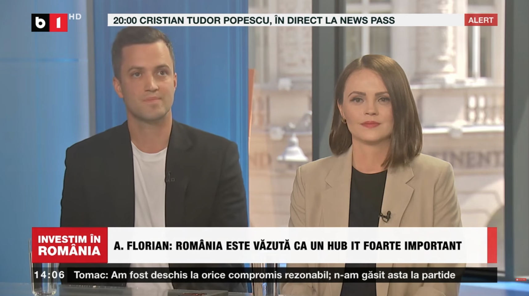 Adrian Florian and Georgina Lupu Florian, co-CEOs of Wolfpack Digital, in the B1 TV studio during "Investim în România", with the on-screen caption "A. Florian: România este văzută ca un hub IT foarte important" (Romania is seen as a very important IT hub)